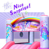 Pink unicorn bounce house with rainbow arch and unicorn banner